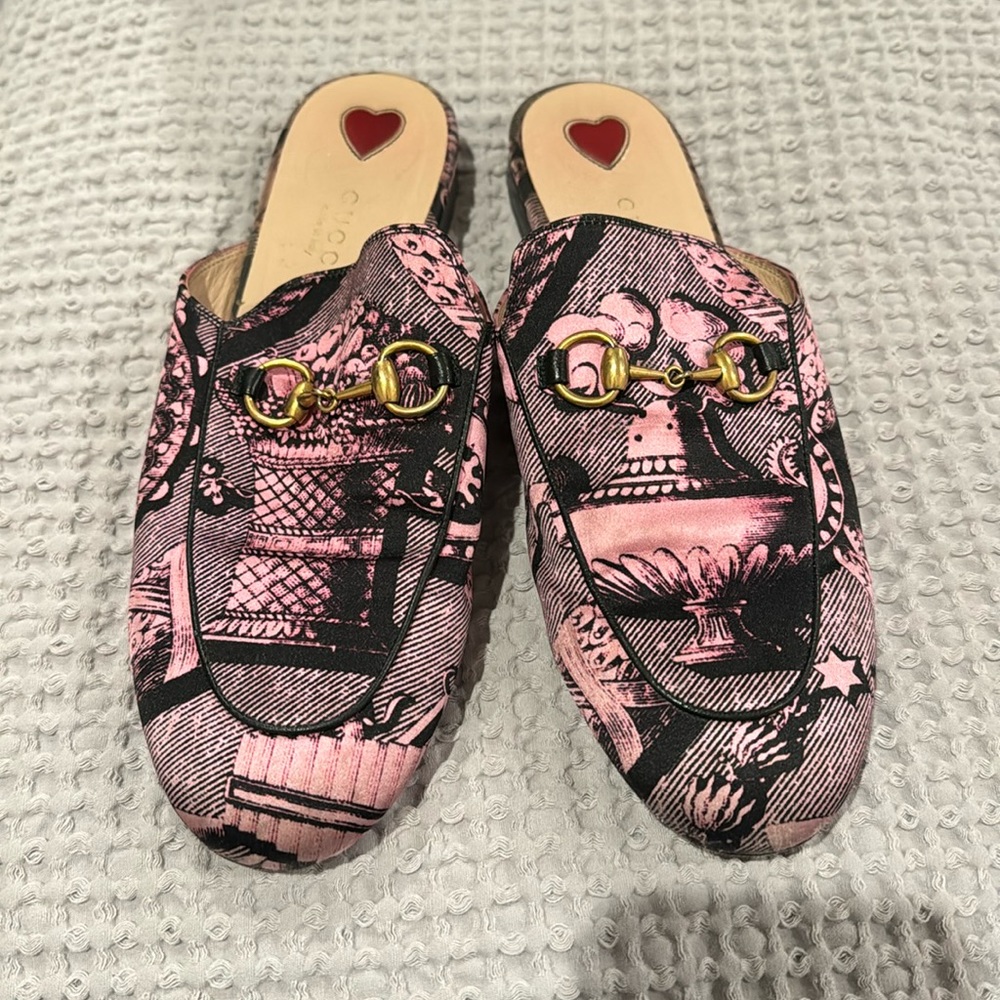 Pink and black Gucci mules